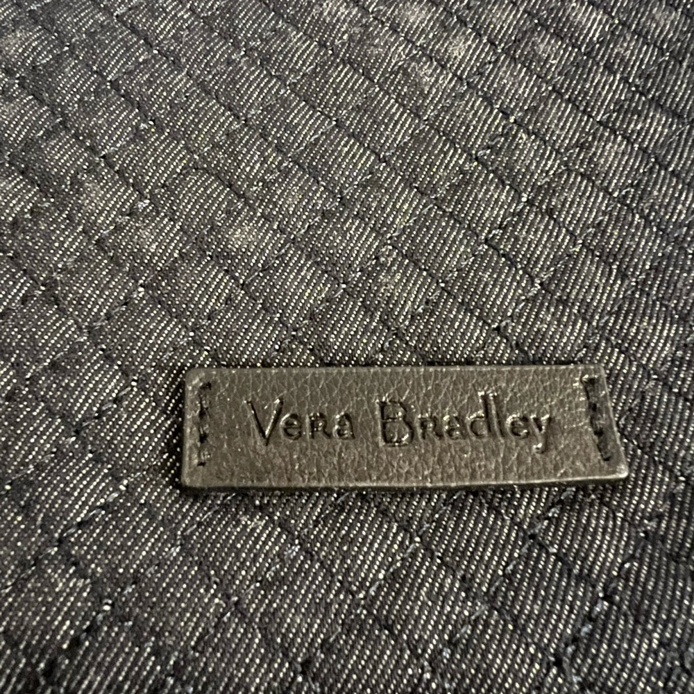 Brand new nwt.  Vera Bradley navy blue crossbody bag. Looks like denim.